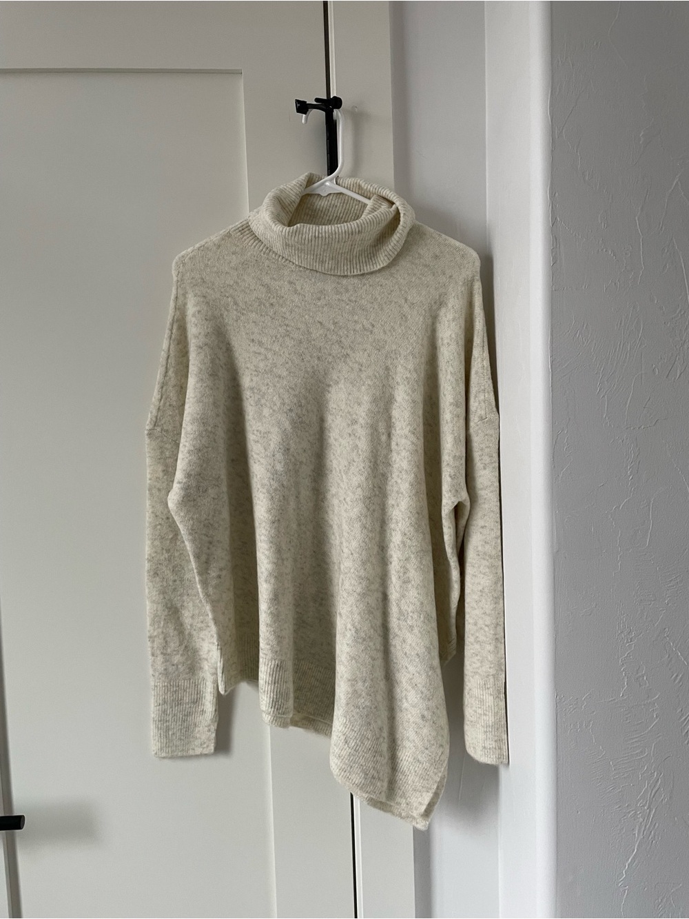Turtleneck Asymmetric Knit Sweater in Oatmeal